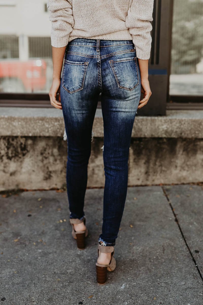 Jeans pitillo efecto roto y desgastado